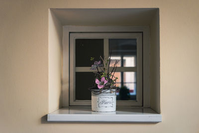 Flower vase on window sill