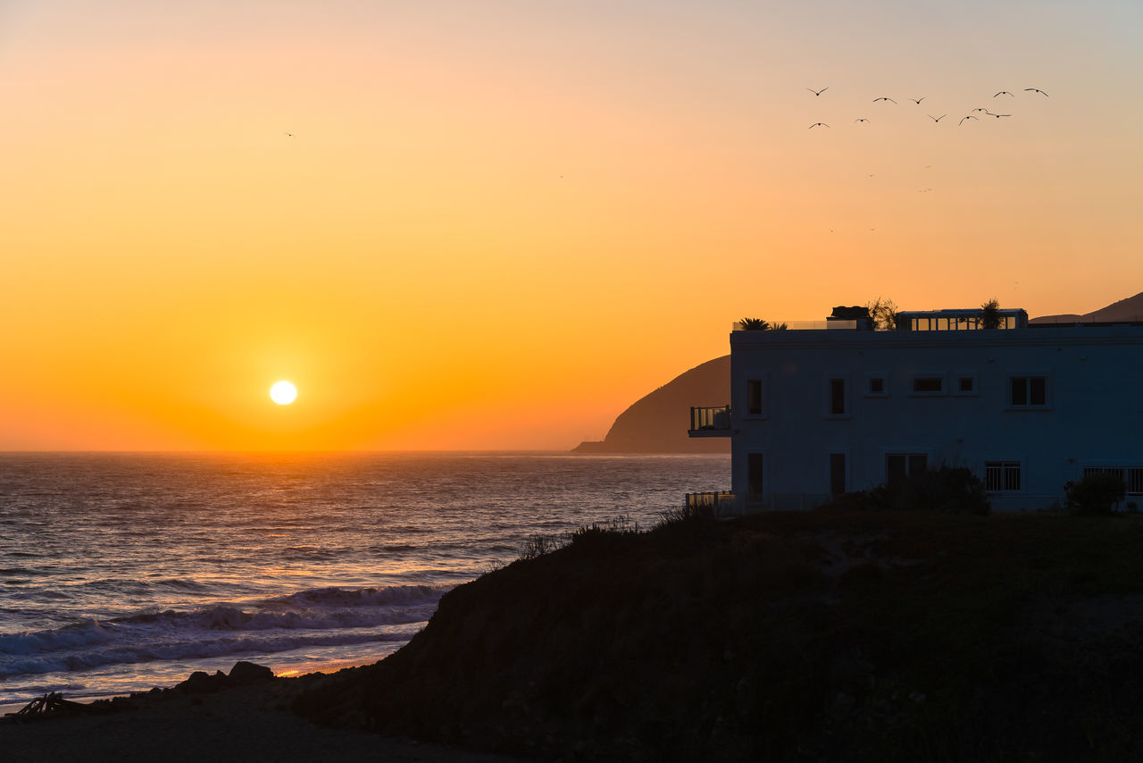 VIEW OF SEA AT SUNSET