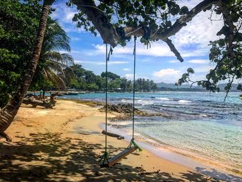 Scenic view of beach against sky