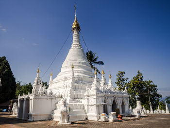 Exterior of temple against building