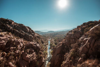 Panoramic view of mountains against clear sky