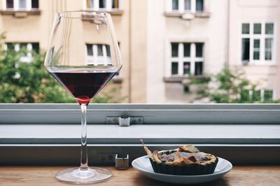 Close-up of wine in glass on table