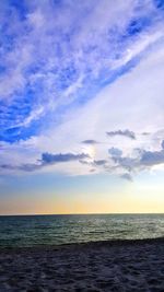 Scenic view of sea against sky at sunset