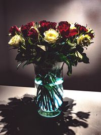 Close-up of flower vase on table