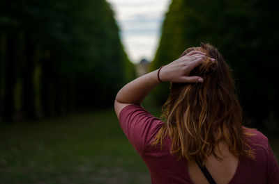 Portrait of woman standing outdoors