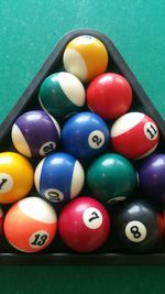 High angle view of multi colored balls on table