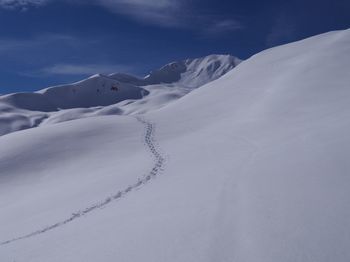 Snow covered mountain against sky