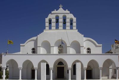 Low angle view of building against blue sky