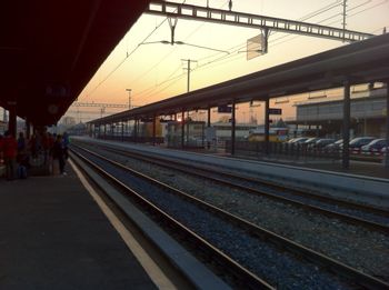 Railroad station platform at sunset