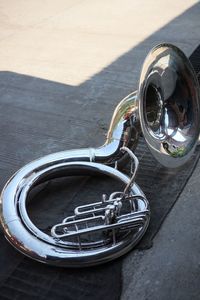 High angle view of sunglasses on street