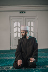 Man praying in mosque