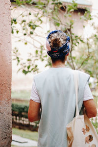 Side view of young woman looking away