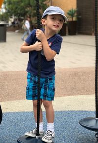 Full length of boy standing outdoors