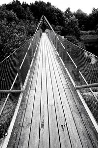 Footbridge against sky