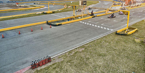 High angle view of people walking on road