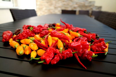 Close-up of chilies on table