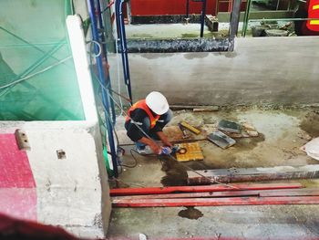 High angle view of worker working at construction site