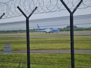 View of airplane on airport runway