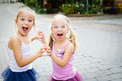 Portrait of happy girl playing