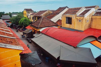 High angle view of city buildings against sky