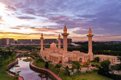 Panoramic view of buildings against sky during sunset