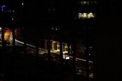 View of buildings in city at night