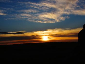 Scenic view of silhouette landscape against sky during sunset