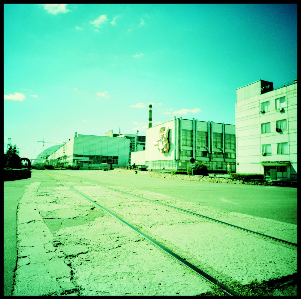 The reactors 1-3 in Chernobyl, still working until this day Analogue Photography Bridge Chernobyl Chernobyl 1986 Chernobyl Bridge Chernobyl Catastrophe Chernobyl Exclusion Zone Chernobyl Monument Chernobyl Nature Chernobyl Nuclear Power Plant Chernobyl Reactor Chernobyl Reactor 1-3 Lomography Nuclear Disaster Nuclear Energy Nuclear Power Plant Architecture Outdoors Power Plant Radioactive Rails Railtracks Soviet Union Travel Ukraine Xpro