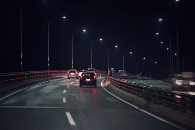 Cars on road at night