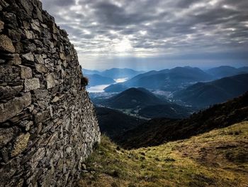 Scenic view of rocky mountains against sky