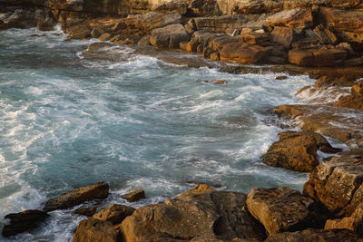 Scenic view of rocks in sea