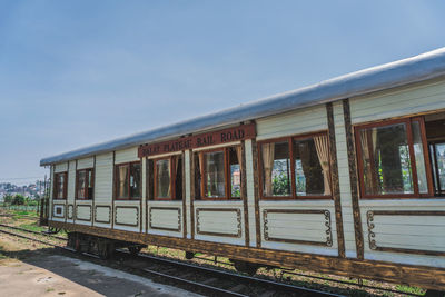 Train on railroad tracks against sky