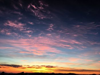 Scenic view of calm sea at sunset