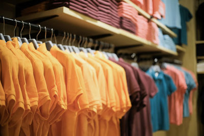 Clothes hanging in store for sale