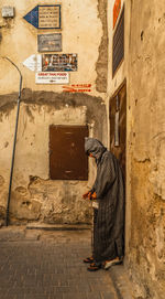 Man standing by building 