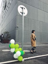 Full length of a boy with balloons