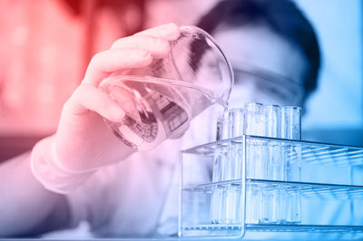 Close-up of scientist working at laboratory