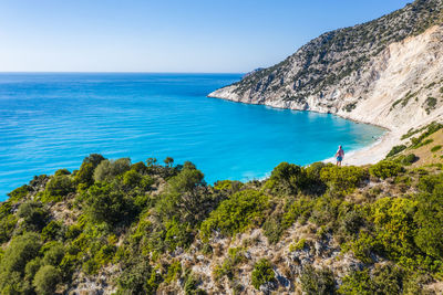 Scenic view of sea against clear blue sky