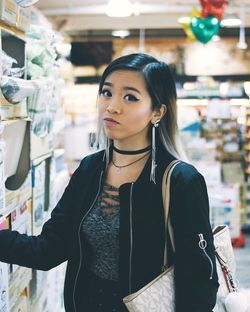 Portrait of woman standing in store