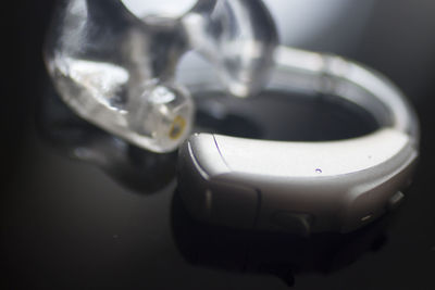 High angle view of faucet in container on table