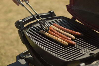 Close-up of meat on barbecue grill