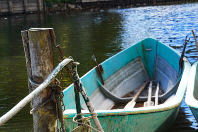 High angle view of fishing boat moored in lake