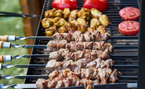 Close-up of meat on barbecue grill