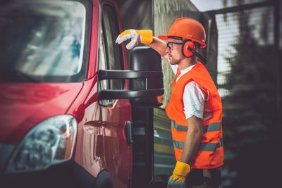 Man working in car