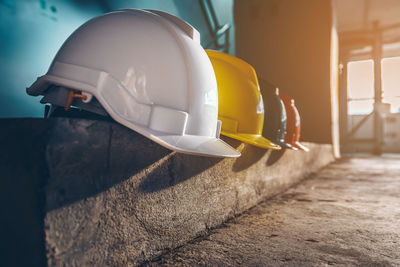 Low angle view of yellow hat on construction site