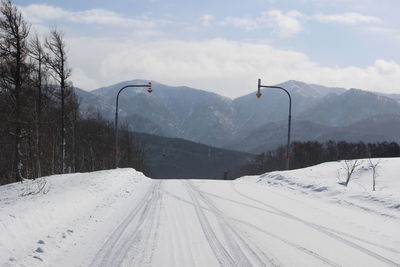 Snow covered mountain against sky