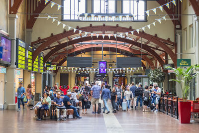 People in the waiting hall at gothenburg's train station