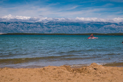 View of the sea and swimmers from the queen's beach, nin, croatia