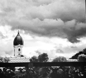 Built structure against cloudy sky