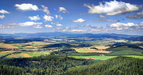 Aerial view of agricultural field against sky